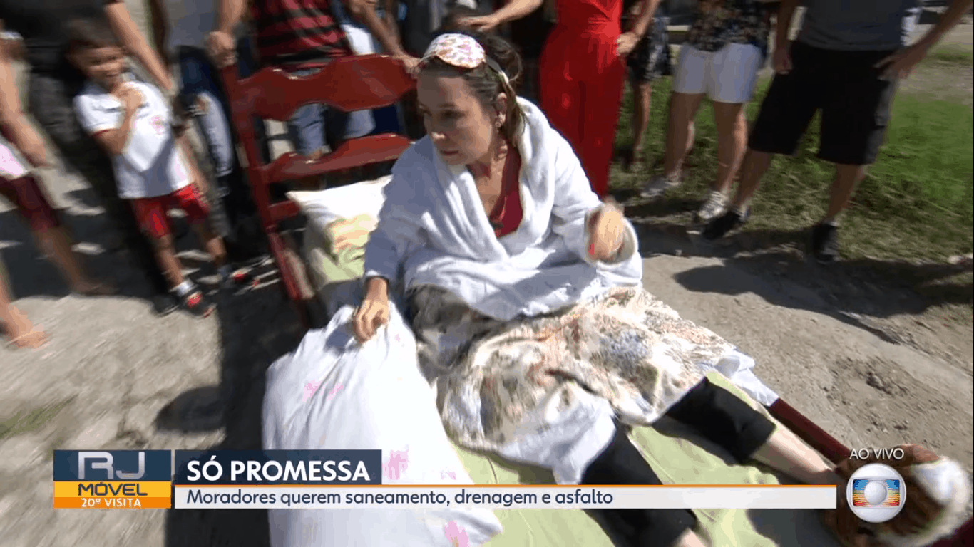 Repórter da Globo causa na web ao surgir na cama, e de pijama, no “RJ1”