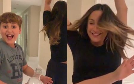 Claudia Leitte tira tampa de garrafa com barrigão e impressiona o filho