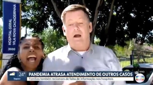 Mulher toma microfone de repórter, ataca a Globo e defende Bolsonaro