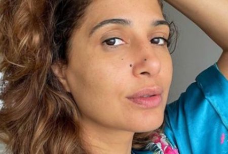 Camila Pitanga é flagrada aos beijos com namorado em aeroporto