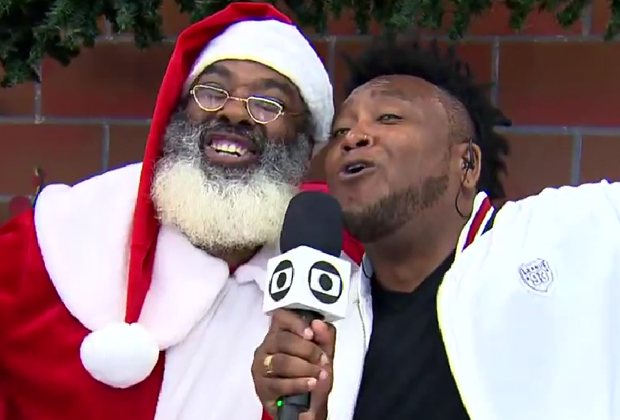 Repórter da Globo se emociona com Papai Noel negro ao vivo