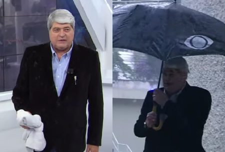 Datena passa perrengue no meio da chuva e fica ensopado ao vivo na Band