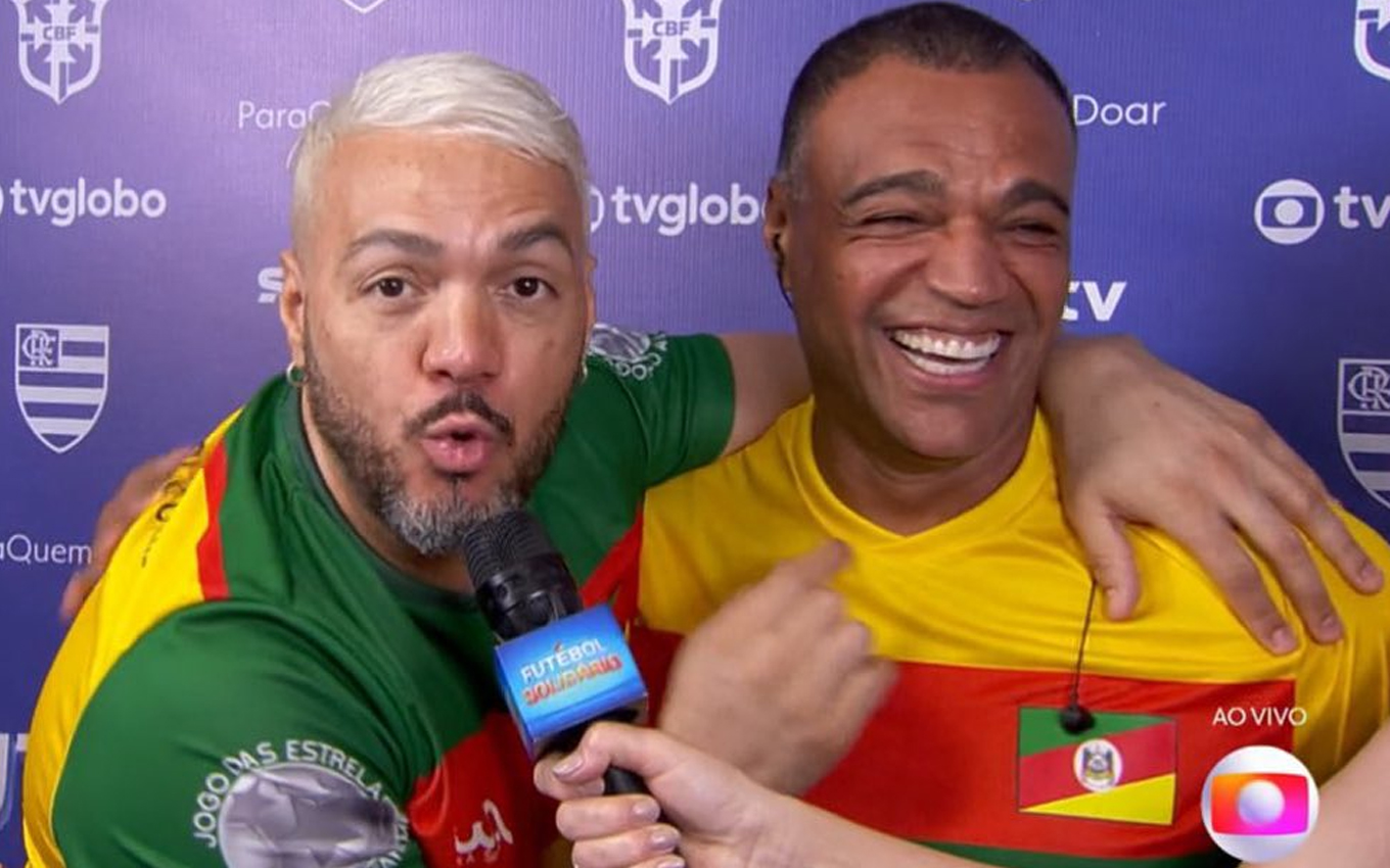 Belo reencontra Denilson na Globo após anos de briga feia na Justiça: “Te amo”