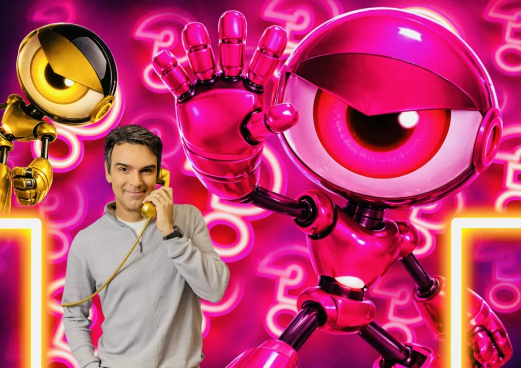 Tadeu Schmidt com telefone dourado ao lado de robôs do Big Brother Brasil em fundo rosa com números neon.