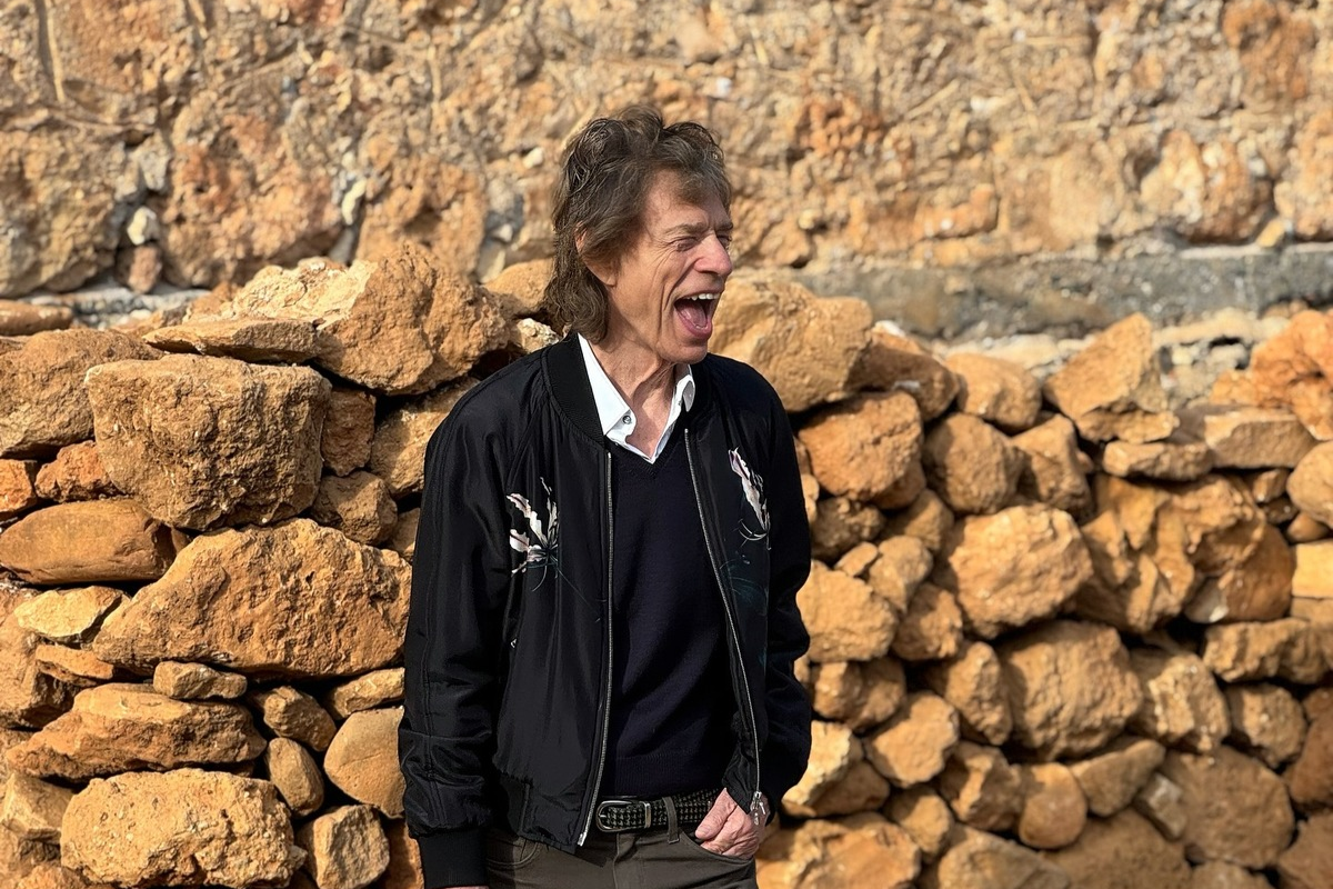 Mick Jagger sorrindo